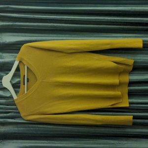 yellow sweater